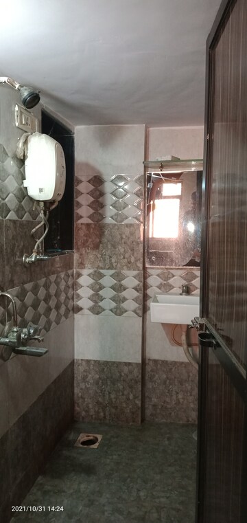 Bathroom in 1 BHK Apartment at Poonam Amisha CHS, Mira Road – for Rent