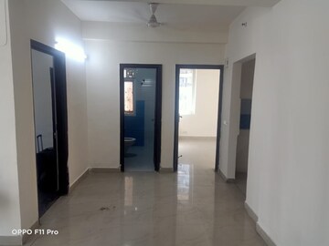 Building Lobby in 2 BHK Apartment at Mahagun Moderne, Sector 78 – for Rent