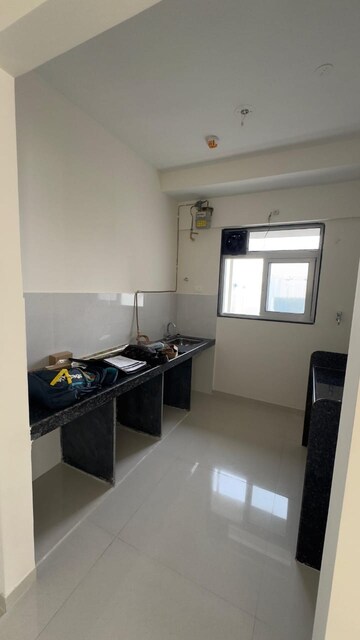 Kitchen in 2 BHK Apartment at Ashar Axis, Majiwada – for Rent