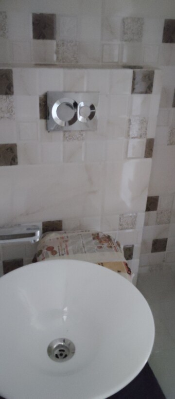 Bathroom in 3 BHK Apartment at Paradigm Business Hermitage Park, Dhakoli Village – for Rent