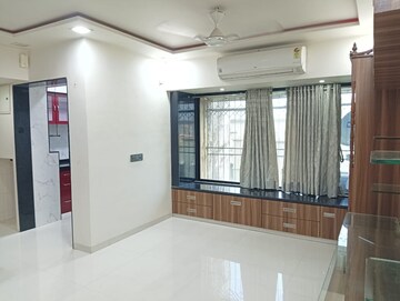 Living Room in 1 BHK Apartment at Dheeraj Valley, Goregaon East – for Rent