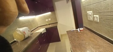Kitchen in 2.5 BHK Apartment at Ace Divino, Sector 1 Greater Noida – for Rent