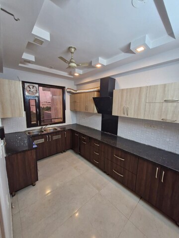 Kitchen in 4 BHK Independent House at Aashrya CHGS, Sector 10a – for Sale