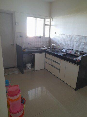 Kitchen in 2 BHK Apartment at Jalan Aura County Pune, Wagholi – for Rent