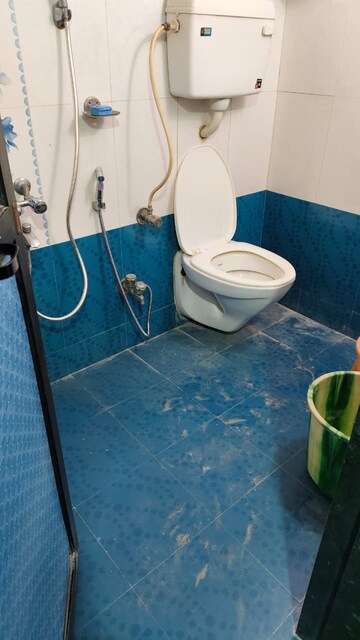 Bathroom in 2 BHK Apartment at Ekdant Anmol Oasis, Naupada – for Sale