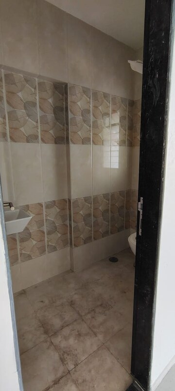 Bathroom in 2 BHK Apartment at Shree Swami Krupa Annapurna Niwas, Naupada – for Sale