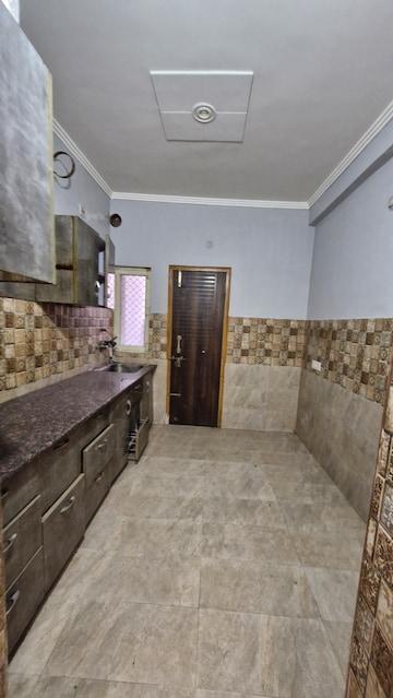 Kitchen in 2 BHK Builder Floor at Gms Road – for Rent