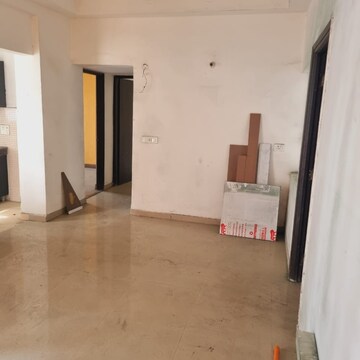 Living Room in 2 BHK Apartment at Antriksh Golf View, Sector 78 – for Rent