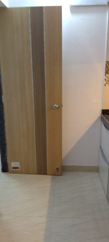 Master Bedroom in 1.5 BHK Apartment at Chamunda Heritage, Andheri East – for Sale