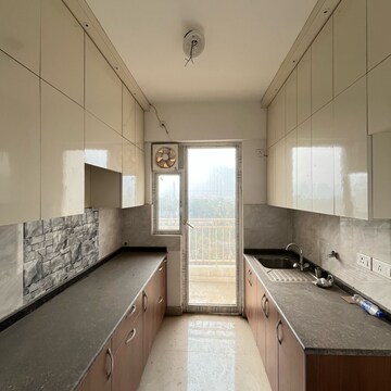 Kitchen in 3 BHK Apartment at Mascot Patel Neotown, Amrapali Dream Valley – for Rent