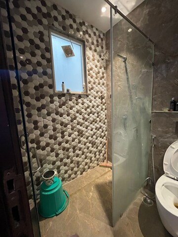 Bathroom in 4 BHK Builder Floor at Ansal Sushant Lok I, Sector 43 – for Rent