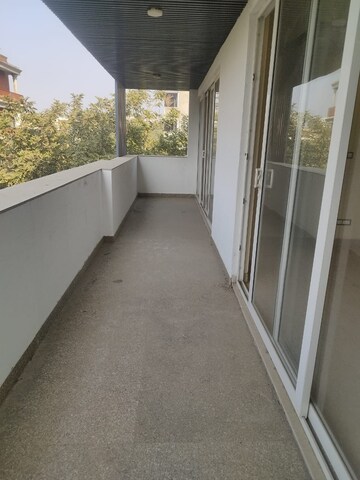 Balcony in 4 BHK Builder Floor at DLF Plaza Tower, Sector 26a – for Rent