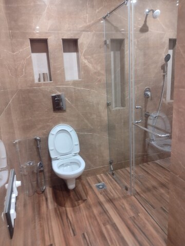 Bathroom in 4 BHK Builder Floor at DLF Plaza Tower, Sector 26a – for Rent