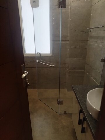 Bathroom in 4 BHK Builder Floor at DLF Plaza Tower, Sector 26a – for Rent