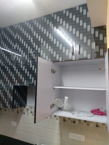 Kitchen in 2 BHK Apartment at Signature Global Orchard Avenue, Sector 93 – for Rent