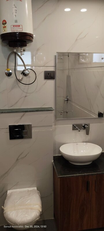 Bathroom in 3 BHK Builder Floor at Bansal Homes, Green Fields Colony – for Sale