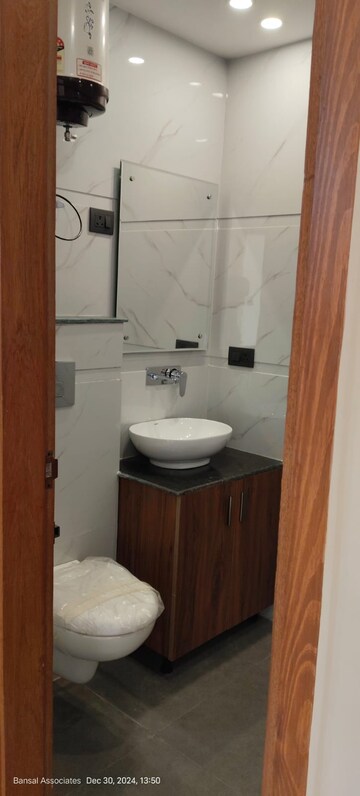 Bathroom in 3 BHK Builder Floor at Bansal Homes, Green Fields Colony – for Sale