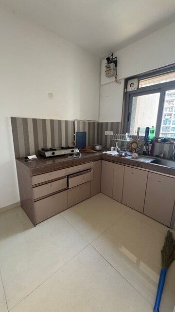 Kitchen in 1 BHK Apartment at Naupada – for Rent
