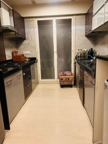 Kitchen in 2 BHK Apartment at Chayya Apartment, Khar West – for Rent