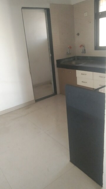 Kitchen in 2 BHK Apartment at Cosmos Jewels, Ghodbunder Road – for Sale