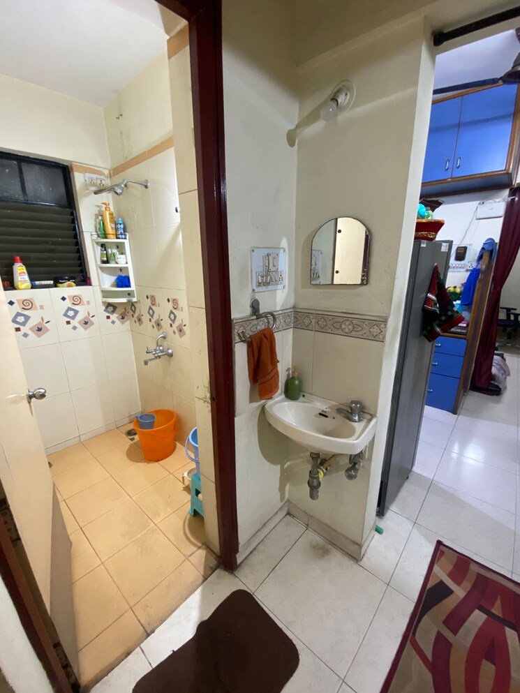 Bathroom, magarpatta-city-heliconia 1 Bedroom 700 Sq.Ft. Apartment In Hadapsar Pune 8036452