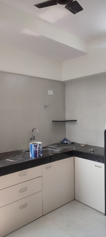 Kitchen in 2 BHK Apartment at Neelyog Towers, Malad East – for Rent