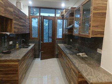 Kitchen in 3 BHK Apartment at DLF Atria, Dlf Phase ii – for Rent