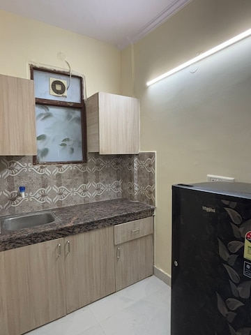 Kitchen in 1 RK Builder Floor at Ansal Sushant Lok I, Sector 43 – for Rent