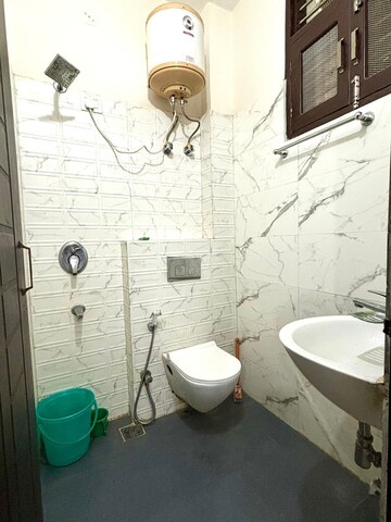 Bathroom in 1 RK Builder Floor at Ansal Sushant Lok I, Sector 43 – for Rent