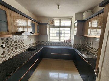 Kitchen in 3 BHK Apartment at Ansal API Palm Floors, Sushant Golf City – for Rent