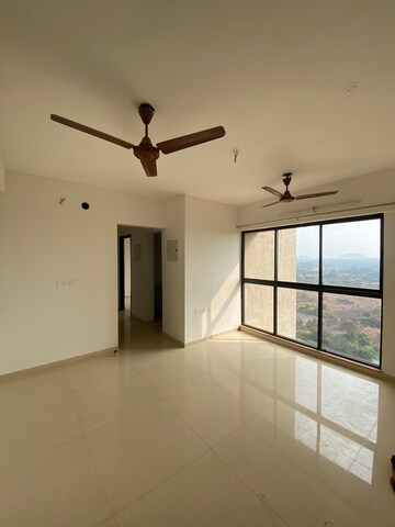 Living Room in 1 BHK Apartment at Lodha Palava Downtown Dombivli East, Dombivli East – for Rent