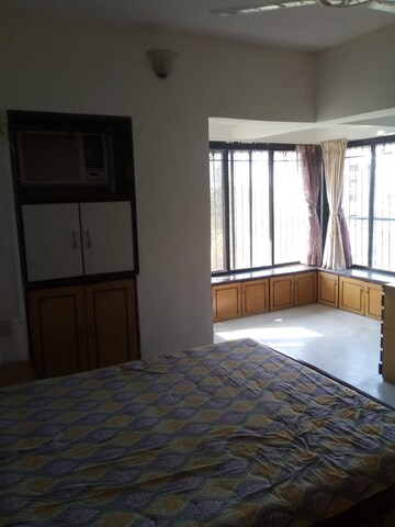 Master Bedroom in 2 BHK Apartment at Mandar CHS	Juhu, Juhu – for Rent
