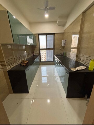 Kitchen in 3 BHK Apartment at Rajesh Raj Infinia, Malad West – for Sale