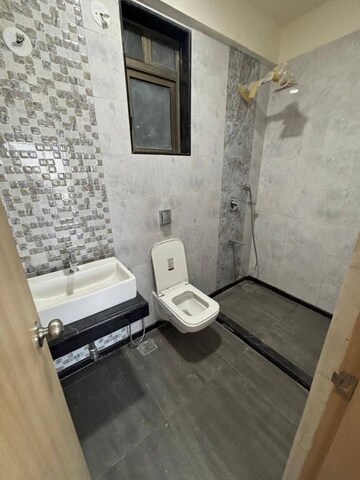 Bathroom in 3 BHK Apartment at Rajesh Raj Infinia, Malad West – for Sale