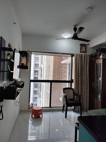Living Room in 1 BHK Apartment at Lodha Crown Quality Homes, Majiwada – for Rent