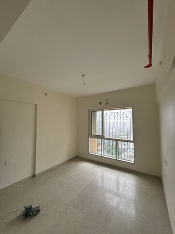 Room in 2 BHK Apartment at Dosti West County, Balkum Pada – for Rent