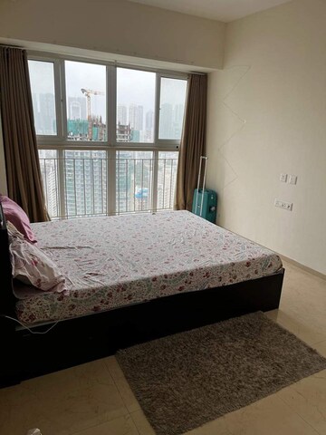 Bedroom in 2 BHK Apartment at Ruparel Ariana, Parel – for Rent