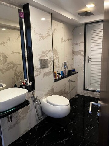Bathroom in 2 BHK Apartment at Ruparel Ariana, Parel – for Rent