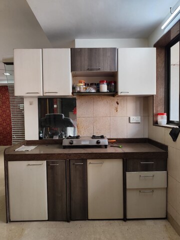 Kitchen in 2 BHK Apartment at Suraj Ashiana, Khar West – for Sale