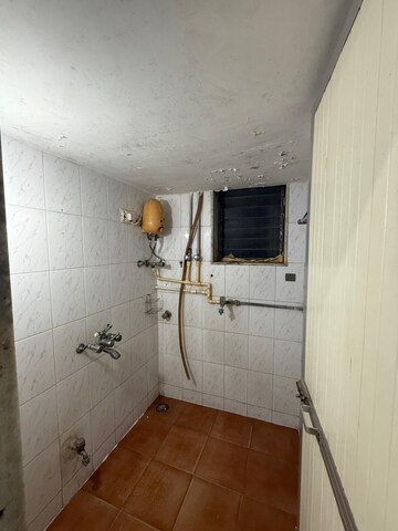 Attached Bathroom in 1 BHK Apartment at Aashay CHS, Dahisar East – for Rent