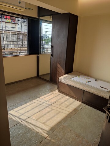 Room in 2 BHK Apartment at Juhu Road – for Rent