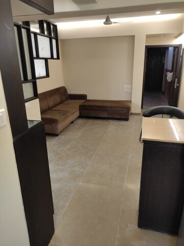 Living Room in 2 BHK Apartment at Juhu Road – for Rent
