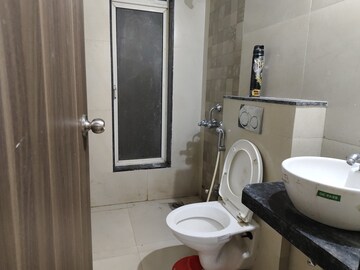 Bathroom in 1 BHK Apartment at JP North Celeste, Mira Road – for Rent