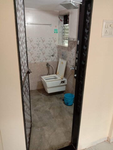 Bathroom in 1 BHK Apartment at Raunak Heights, Ghodbunder Road – for Rent