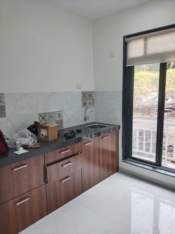 Kitchen in 1 BHK Builder Floor at Shree Niyati Lake Crown, Mogharpada – for Sale