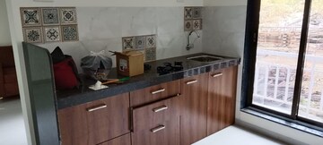 Kitchen in 1 BHK Builder Floor at Shree Niyati Lake Crown, Mogharpada – for Sale