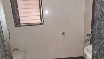 Bathroom in 2 BHK Apartment at Varun Garden, Ghodbunder Road – for Rent