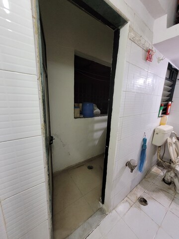 Bathroom in 2 BHK Apartment at Triveni Vasant Vihar CHS, Vasant Vihar – for Sale