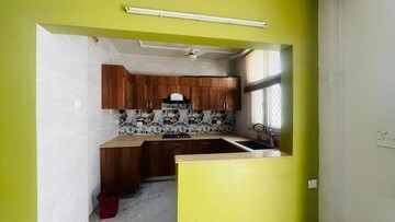 Kitchen in 3.5 BHK Apartment at Ansal Harmony Homes, Sector 57 – for Rent