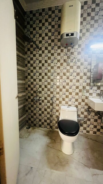 Bathroom in 3.5 BHK Apartment at Ansal Harmony Homes, Sector 57 – for Rent